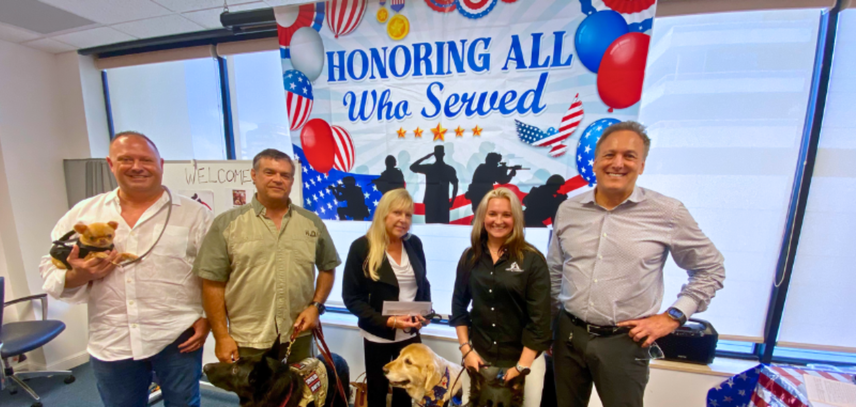 Jones Foster Attorney Steve Rothman with Paws 4 Liberty reps and veterans